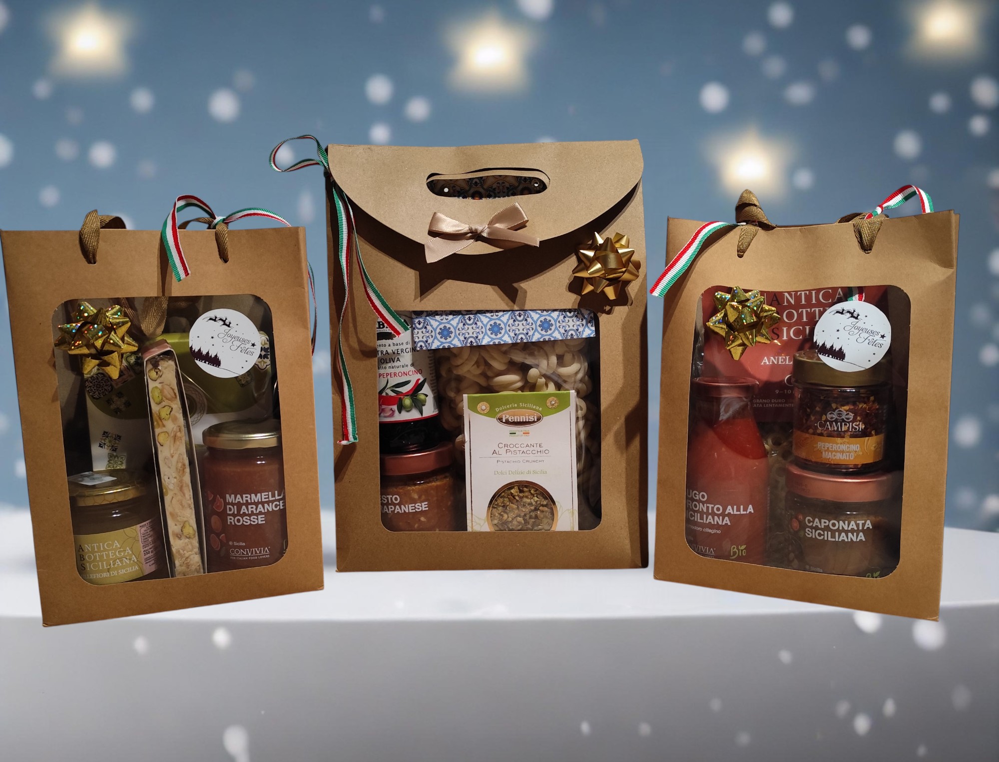 Présentation de 3 paniers garnis de produits siciliens, à offrir.