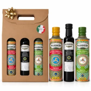 Coffret cadeau huile d'olive Trio Barbera avec deux huiles d'olive siciliennes et un vinaigre balsamique IGP dans son emballage cadeau.